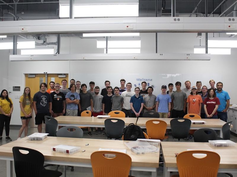 Group photo of Summer Bridge and Discovery Days participants in the lab