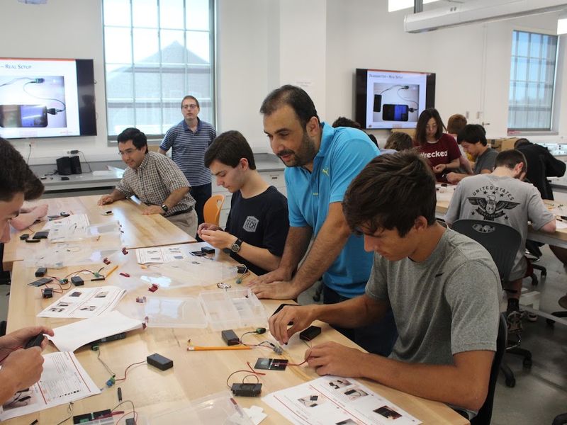 Students building light-wave communication circuits at a Summer Bridge workshop